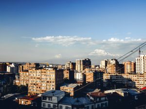 aerial view of Yerevan city buildings under blue sky, Armenia